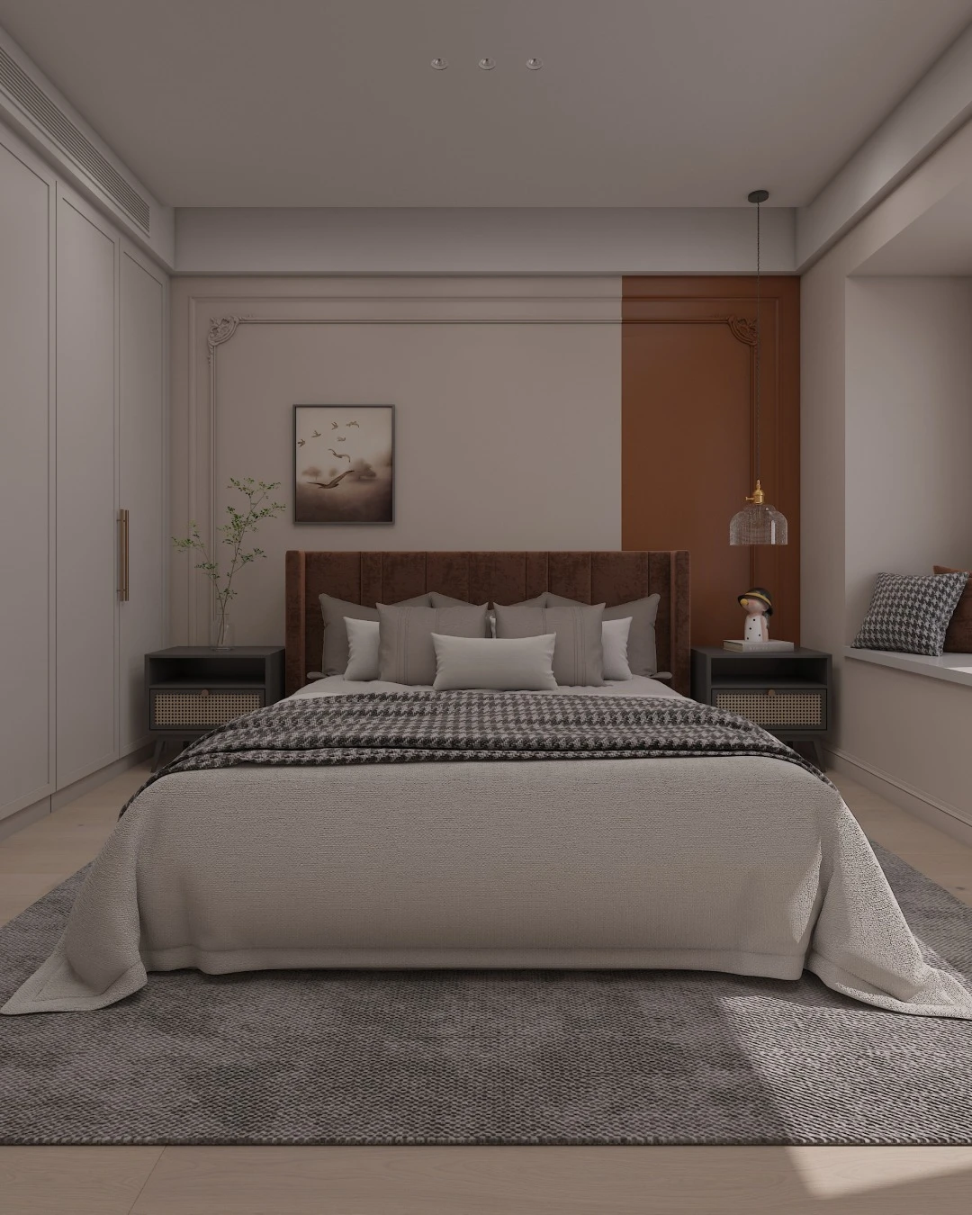 A small bedroom featuring a warm brown headboard, dark nightstands, and an intriguing accent wall with a two-tone design and decorative molding. A built-in window seat provides extra seating and storage.