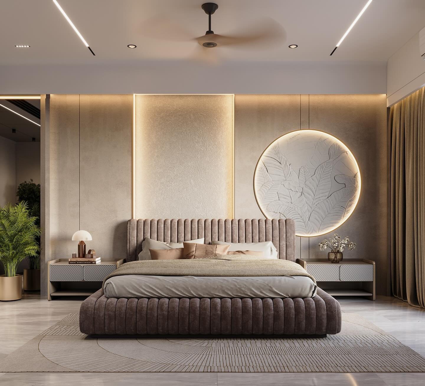 A modern master bedroom with a large bed with a fluted velvet base and headboard, a round wall art piece with a leaf design, and atmospheric backlighting.