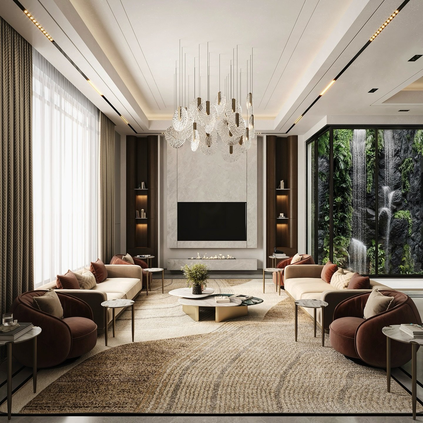 A symmetrical and upscale living room with a neutral palette, featuring two beige sofas, two rust-colored swivel chairs, a modern fireplace, and a large window looking out onto a lush green wall with a waterfall.