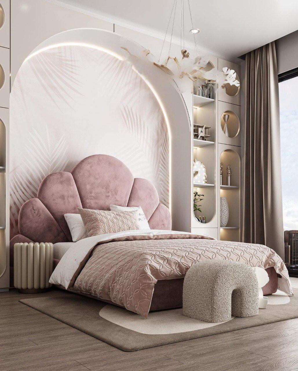 A glamorous teen girl's bedroom with a blush pink and white color scheme, a scallop-shell headboard, and arched built-in shelving with palm leaf wallpaper.