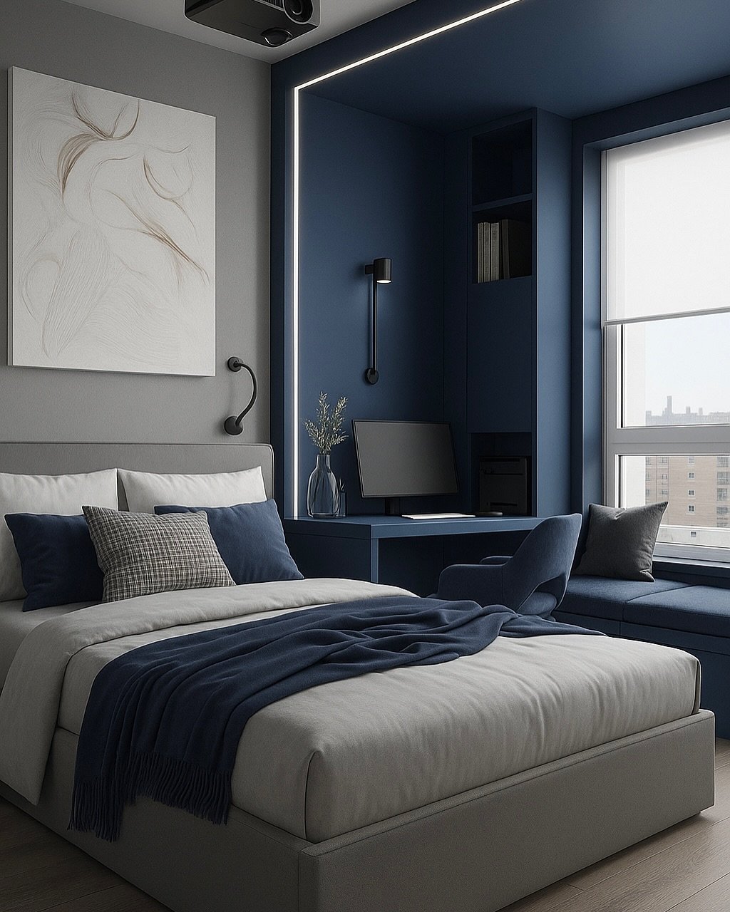 A modern, masculine bedroom with a deep blue accent wall and ceiling. The room features a built-in desk and shelving, a gray upholstered bed with blue and gray pillows, and a large abstract painting.