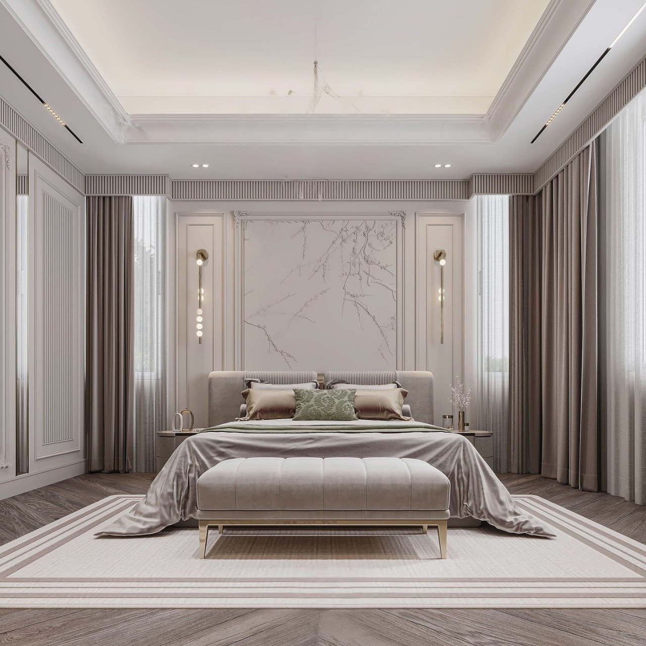 A luxurious master bedroom with an elegant chandelier, a large bed with a headboard framed by sconces, and an accent wall with a subtle tree branch design.