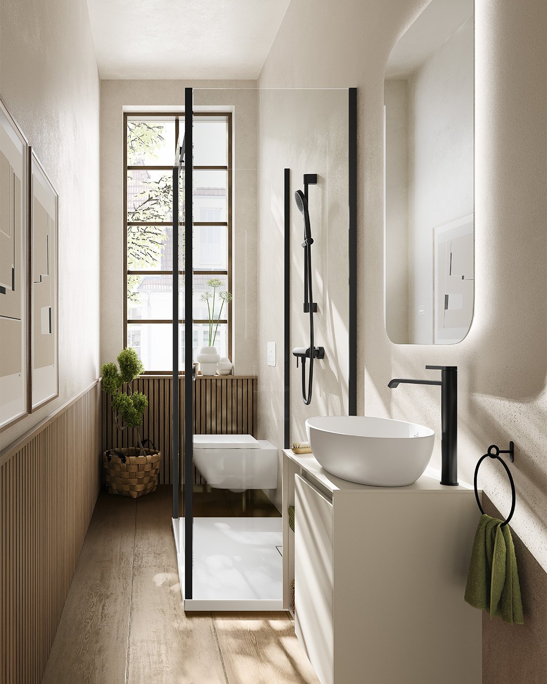 A long, narrow bathroom featuring light wood paneling, a small shower with a black-framed glass door, a floating white vanity with a vessel sink, and a unique-shaped mirror.