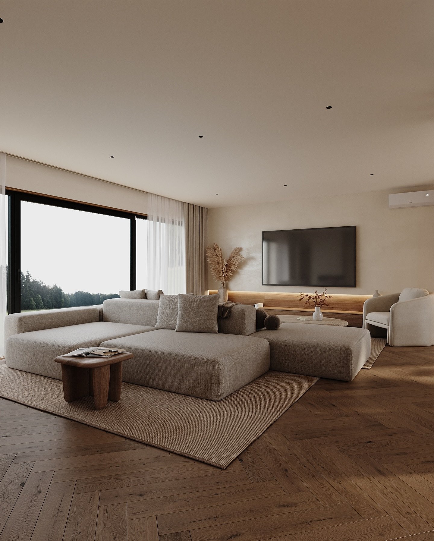 A serene, minimalist living room with a large gray modular sofa, a low-profile media console with backlighting, and a big window overlooking a natural landscape.