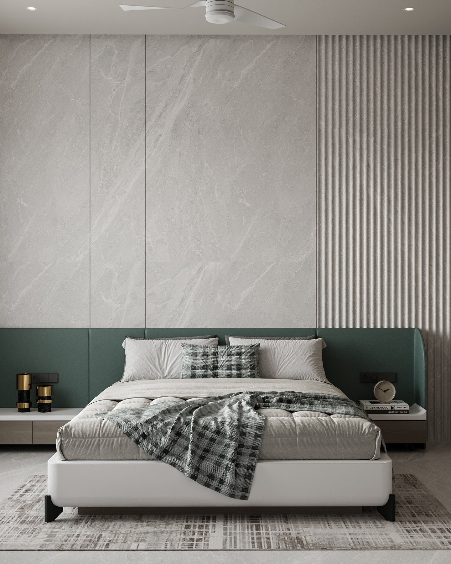A modern bedroom with a low-profile white bed, a vibrant green upholstered headboard, and a feature wall composed of large marble-like panels and fluted panels.