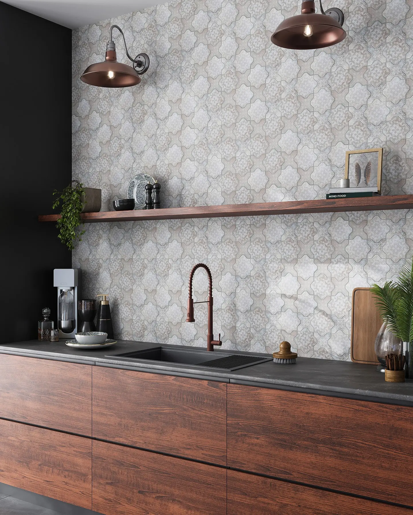 A modern kitchen with a Moroccan-inspired tile backsplash in a neutral gray and white pattern, contrasted by dark wood cabinets and industrial-style lighting.