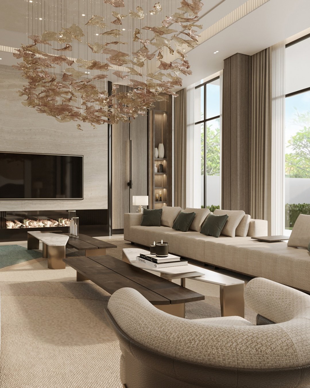 A luxurious living room with a large, beige modular sofa, a linear fireplace, and a stunning, organic-shaped chandelier made of delicate glass leaves.