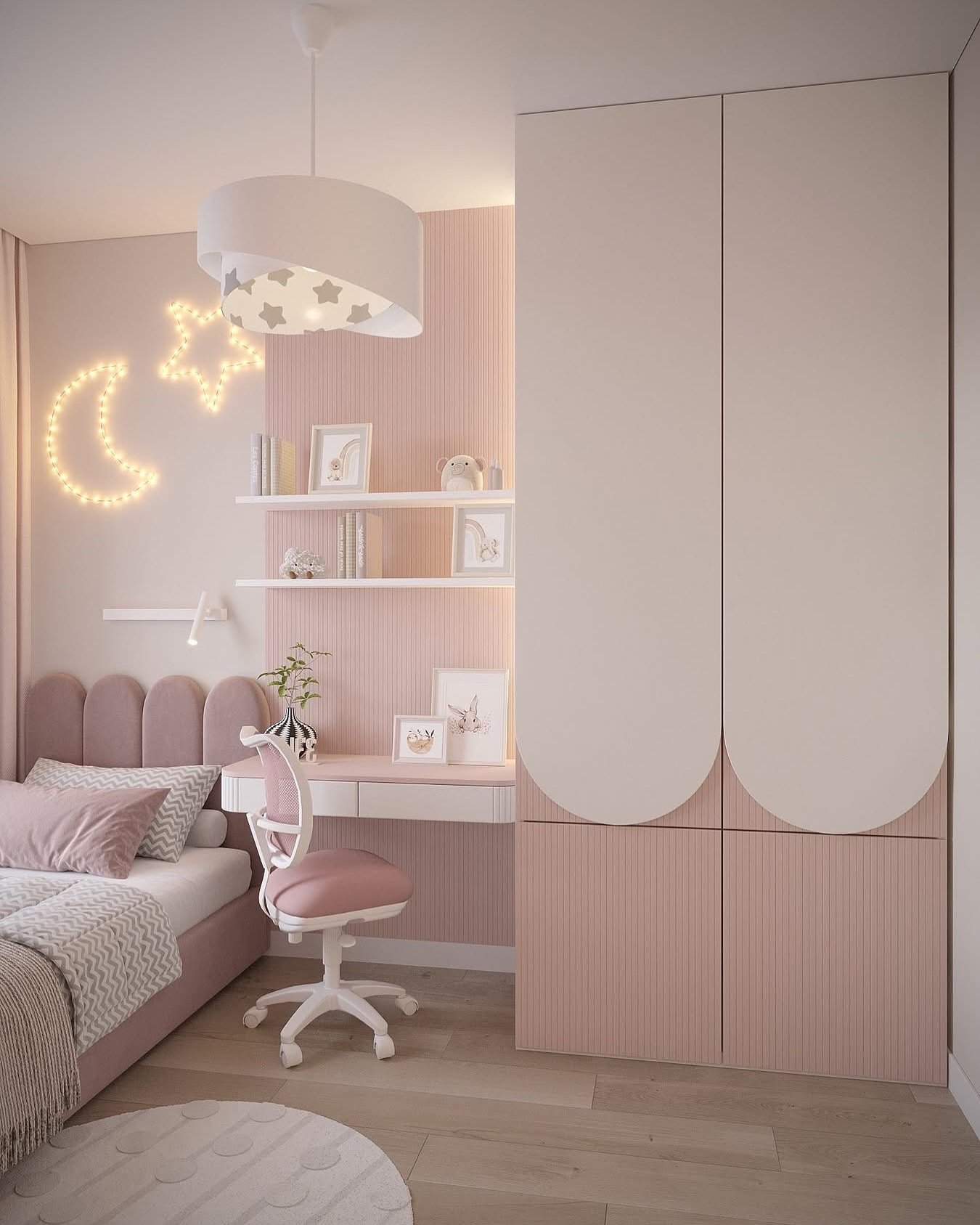 A modern girl's bedroom with a curved pink headboard, a built-in white desk, and wardrobe with arched details, and a star and moon neon light.