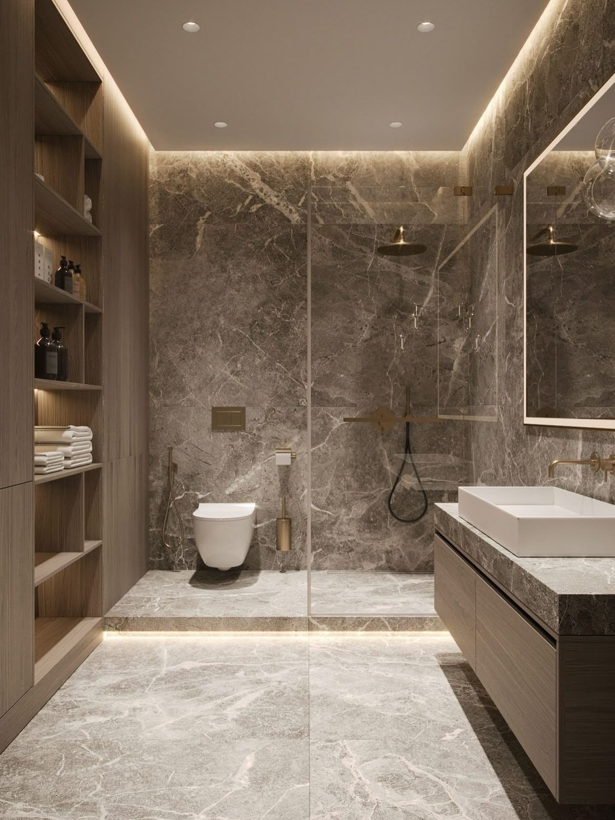 A small, elegant bathroom featuring grey marble-look tiles on the walls and floor, a floating wood vanity, and a glass-enclosed shower.