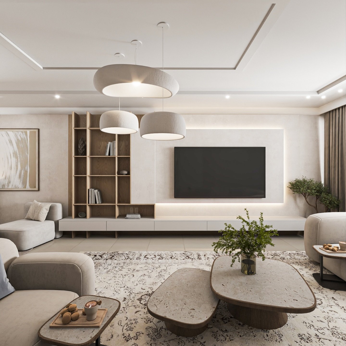 A contemporary living room with a neutral color palette, featuring a large TV mounted on a lit accent wall, a low console, and unique, irregular-shaped coffee tables.