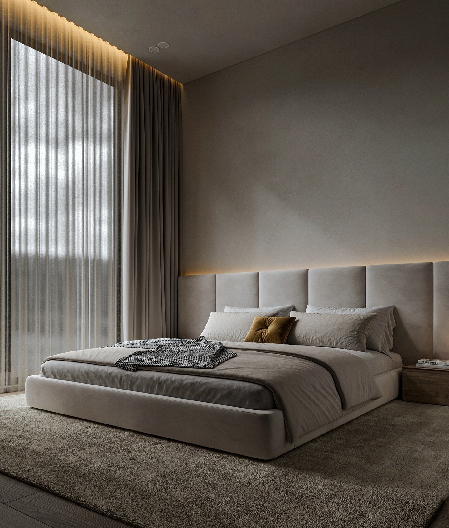 A modern bedroom with a light gray upholstered bed and a tall, paneled headboard with hidden LED lighting. A large window is draped with sheer and heavy curtains, and the room has a soft, neutral color palette.