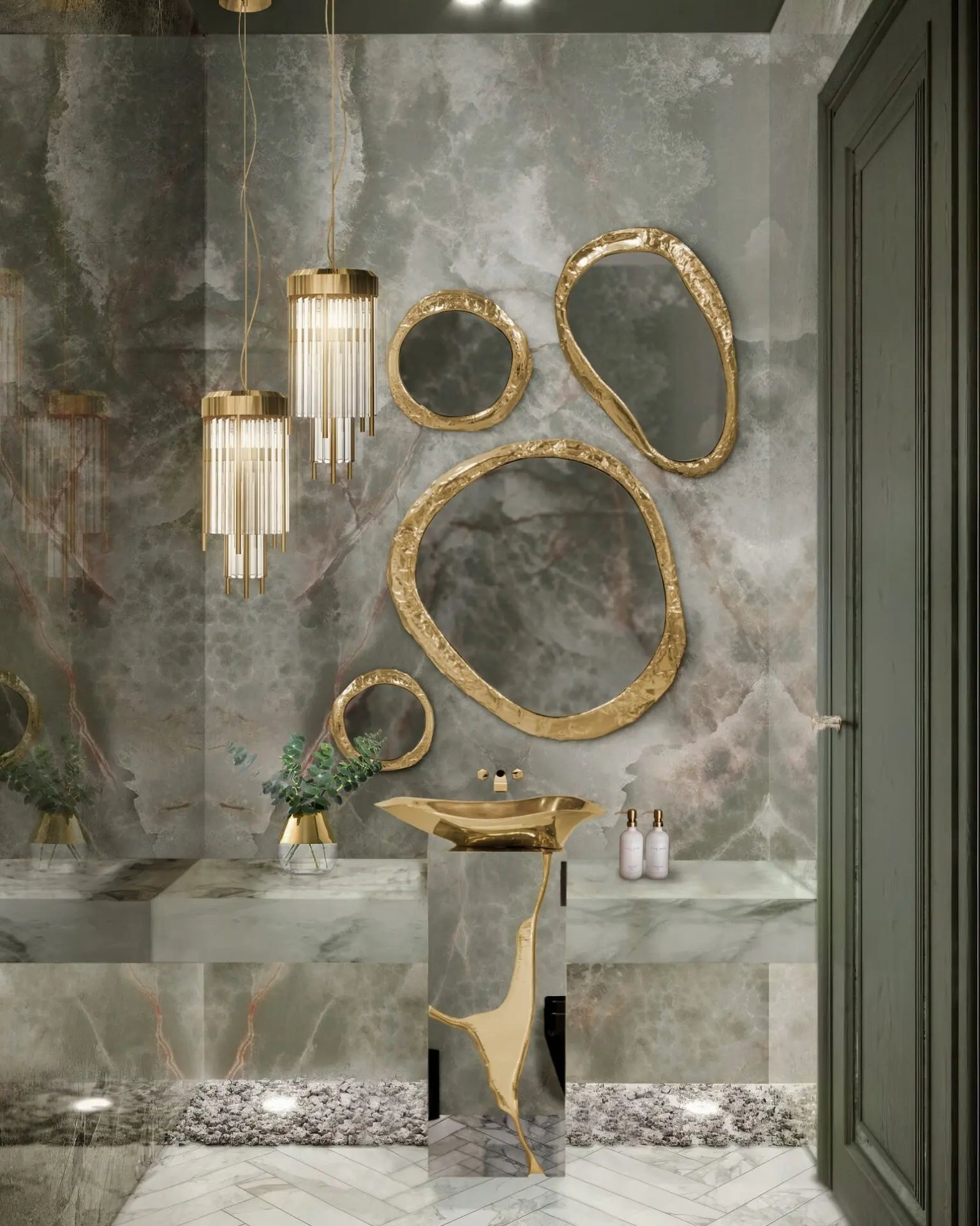 A luxurious bathroom with a cluster of gold, organically shaped mirrors above a gold pedestal sink shaped like a crane.
