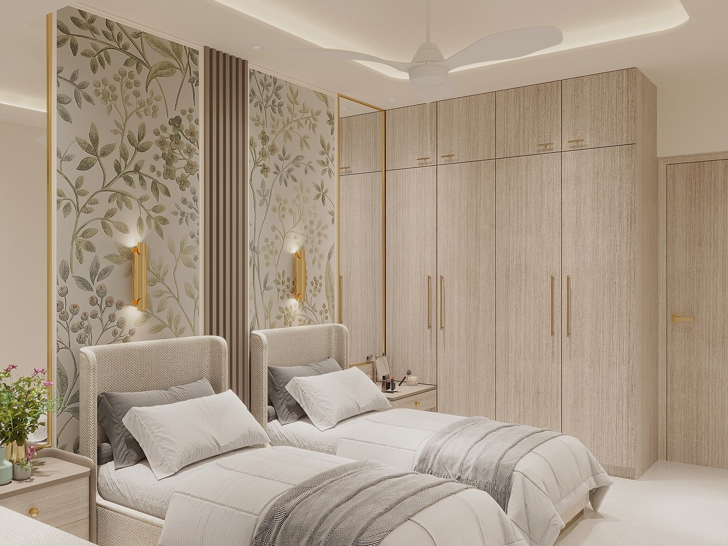 A twin bedroom with two beds against a botanical-patterned wallpaper wall and large built-in wardrobes.