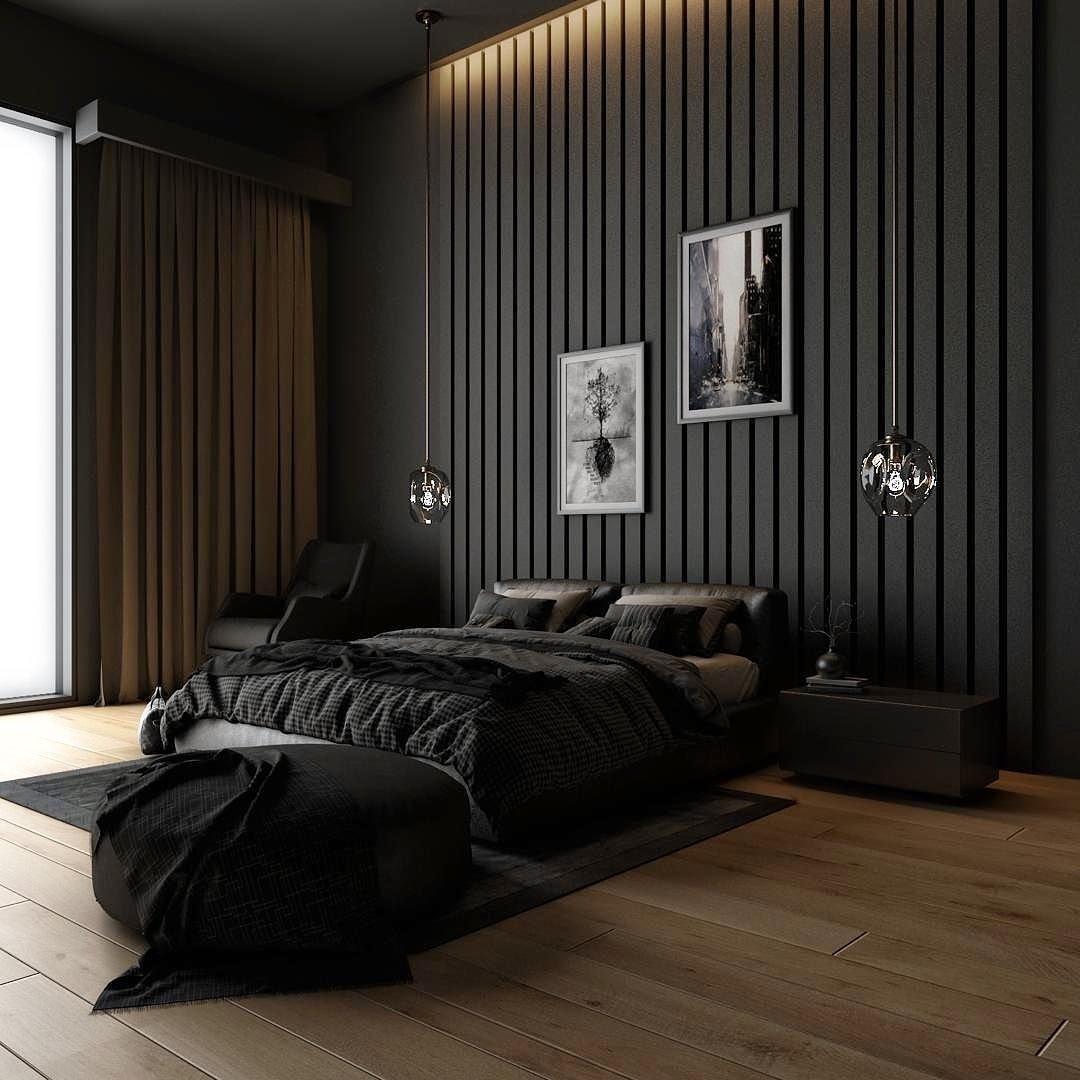 A sleek black bedroom with a slatted accent wall, a low-profile bed with dark bedding, and light wood flooring.