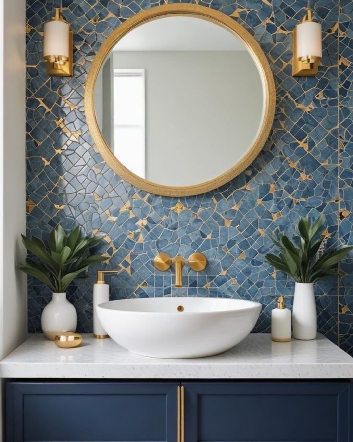 A white vessel sink on a white marble countertop with a dark blue vanity cabinet.