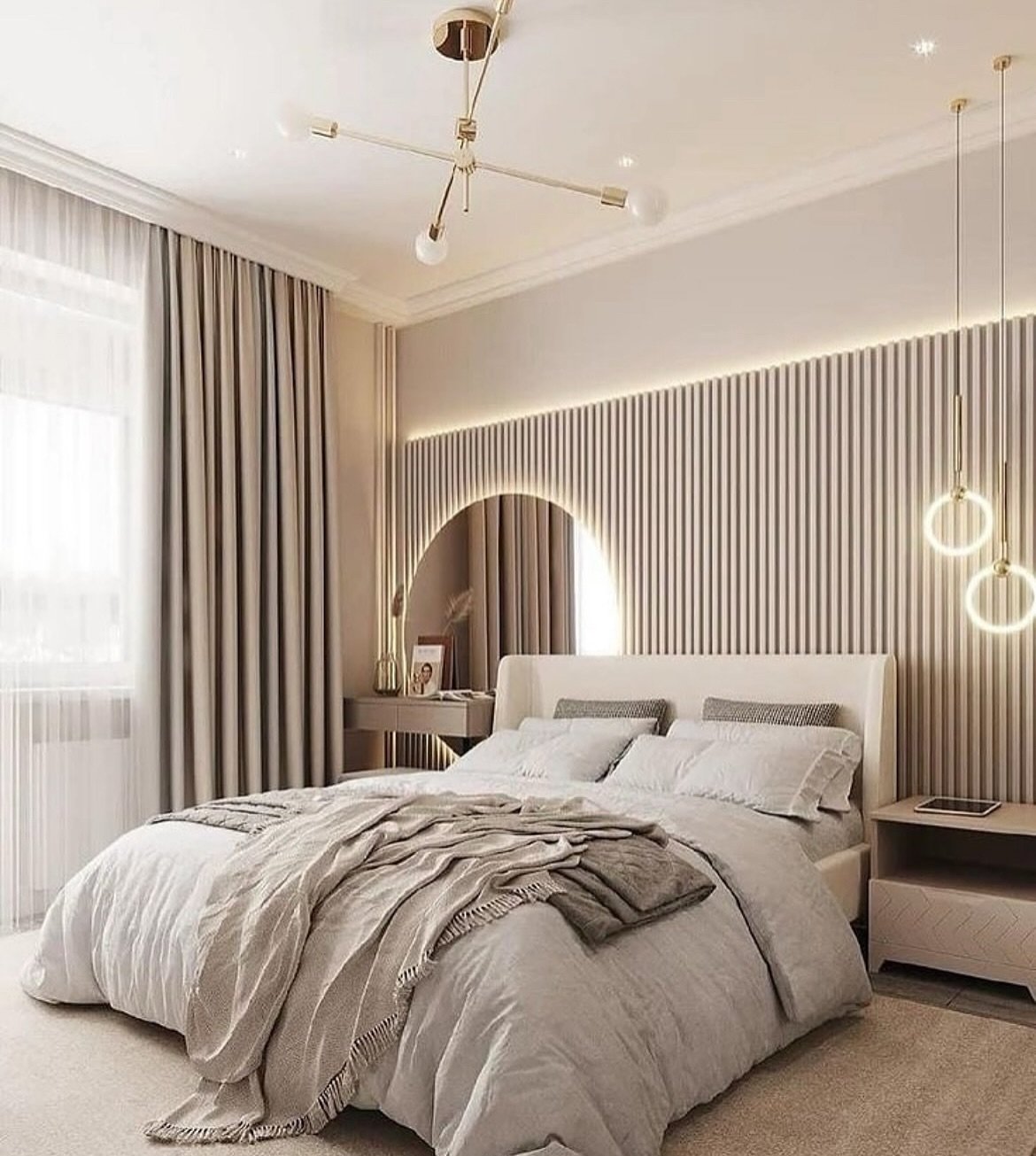 A cozy, modern bedroom with a textured wall panel behind the bed, a circular illuminated mirror, and a muted color palette.