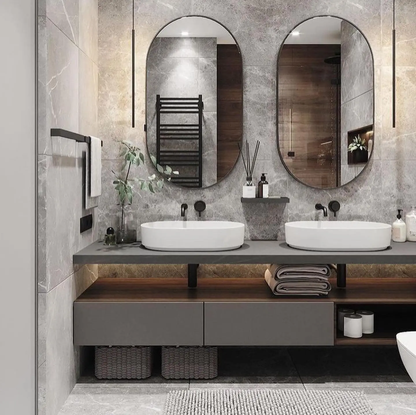 A contemporary bathroom with two identical black-framed capsule mirrors above a double sink vanity with a floating wood cabinet.