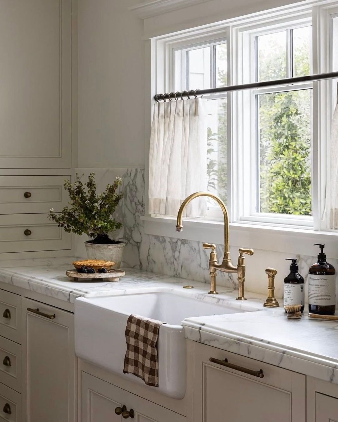 Custom floor-to-ceiling drapes featuring an oversized, colorful botanical print.