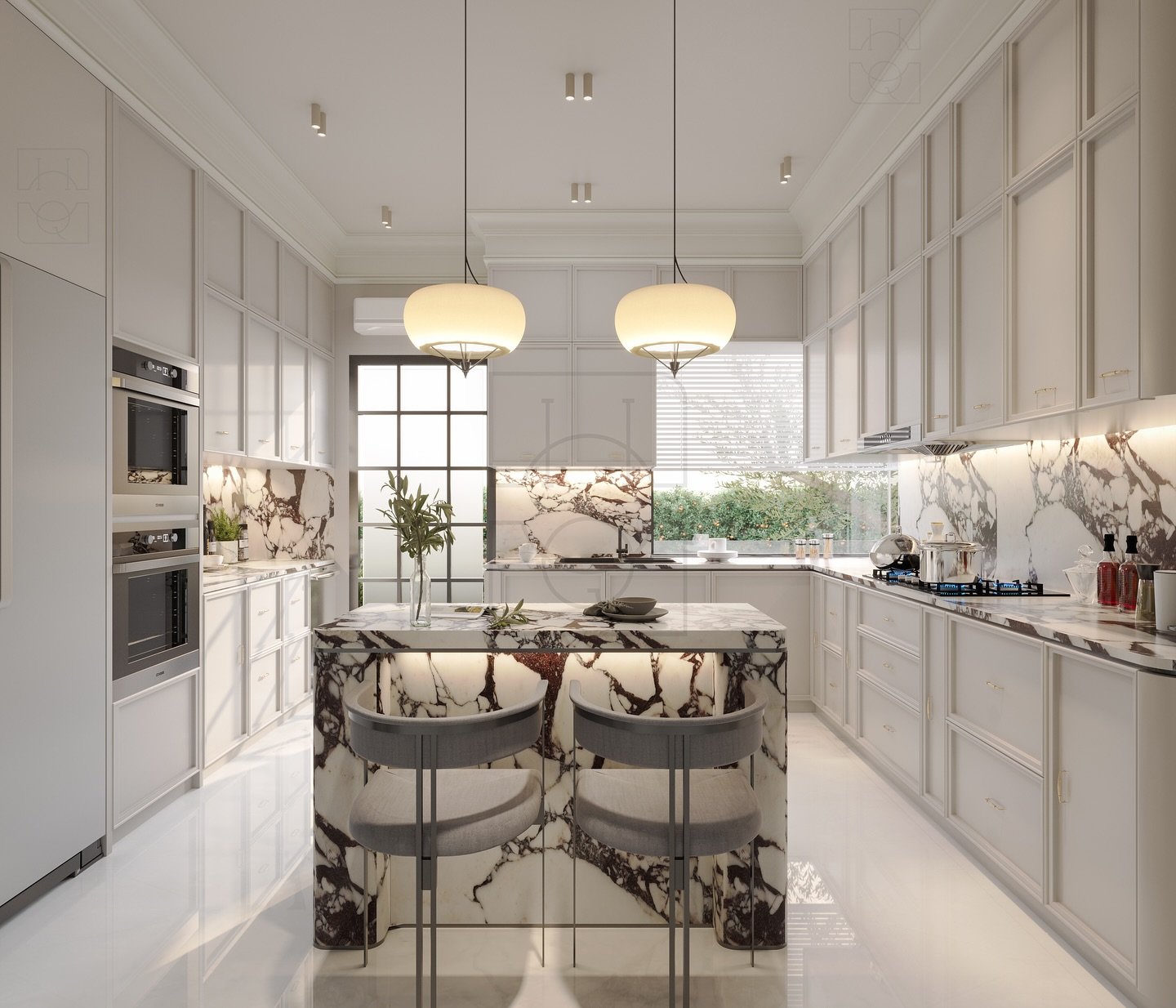 Bright U-shaped kitchen featuring white Shaker-style cabinets, integrated double ovens, and a striking waterfall island and backsplash made of richly veined dark marble.