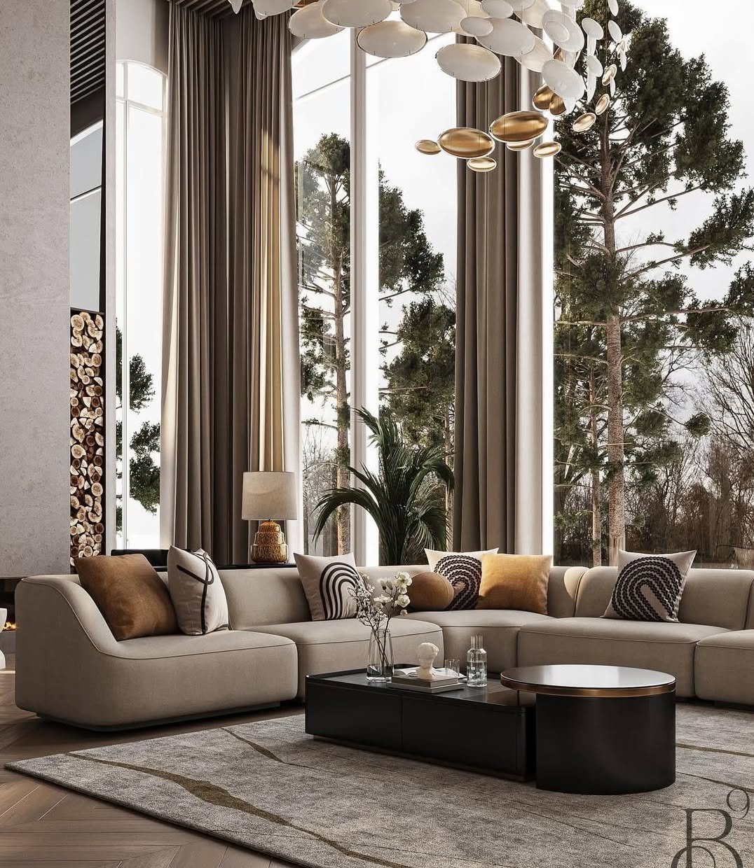 High-ceiling living room with beige curved sectional sofa, large windows, wood storage feature, and modern sculptural chandelier.