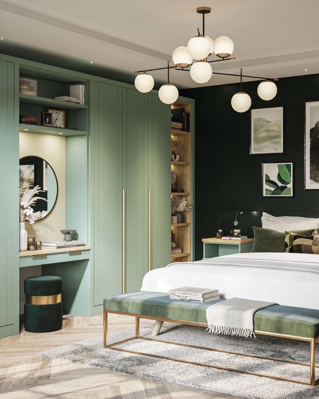 A modern bedroom featuring sage green built-in cabinetry, a dark green accent wall, and a low, rectangular bench upholstered in dark green velvet with a thin gold metal frame.