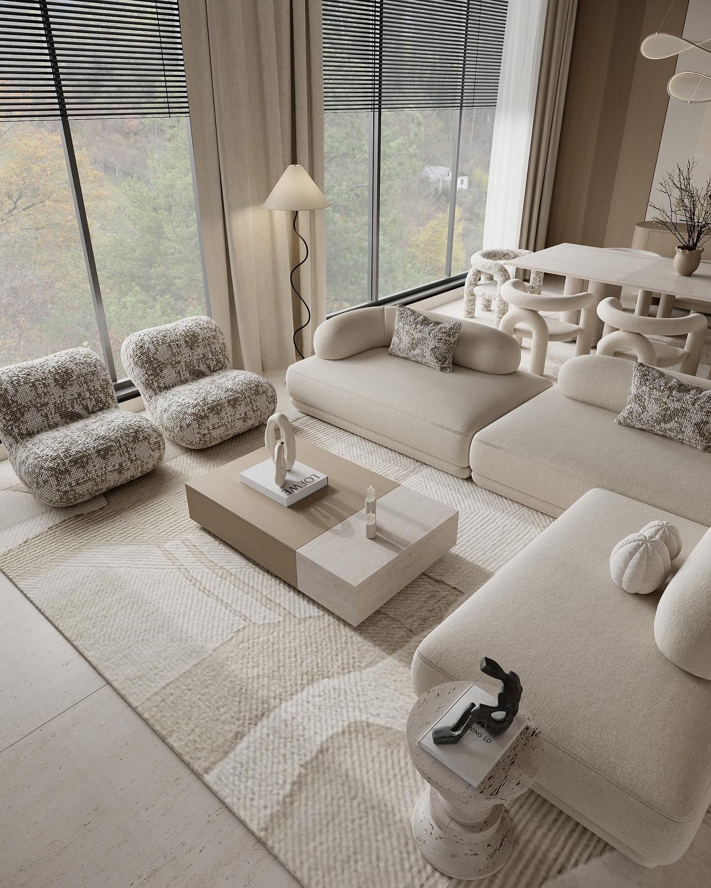 A luxurious, high-end beige living room featuring panoramic window views, plush curved seating, two speckled accent chairs, and a geometric block coffee table.