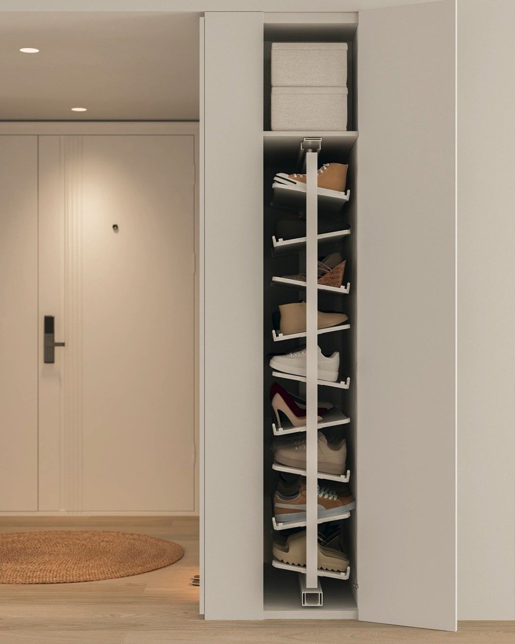 Tall, narrow pull-out shoe rack hidden inside a white cabinet near a front door.