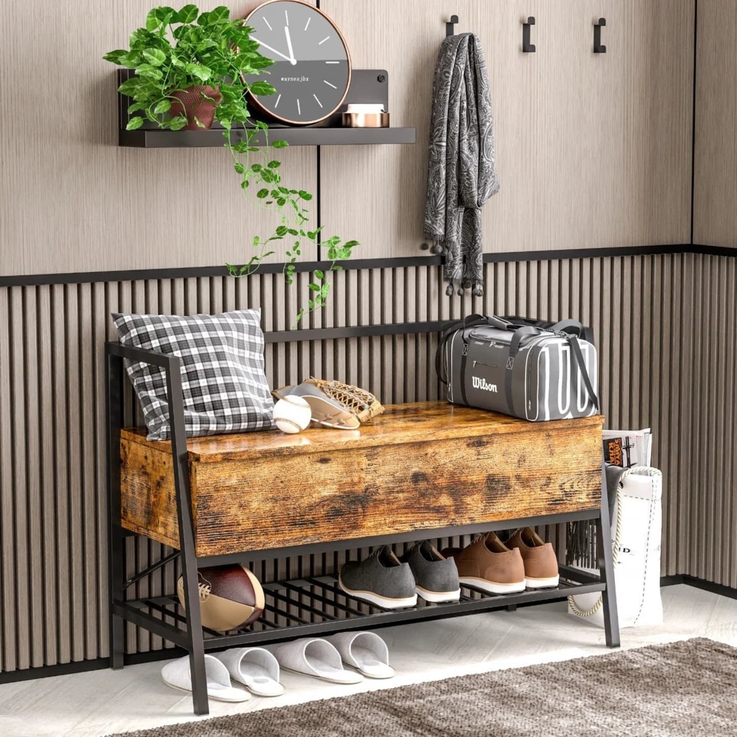 Rustic wood and black metal bench in an entryway, with a lift-top compartment and open lower shoe rack.