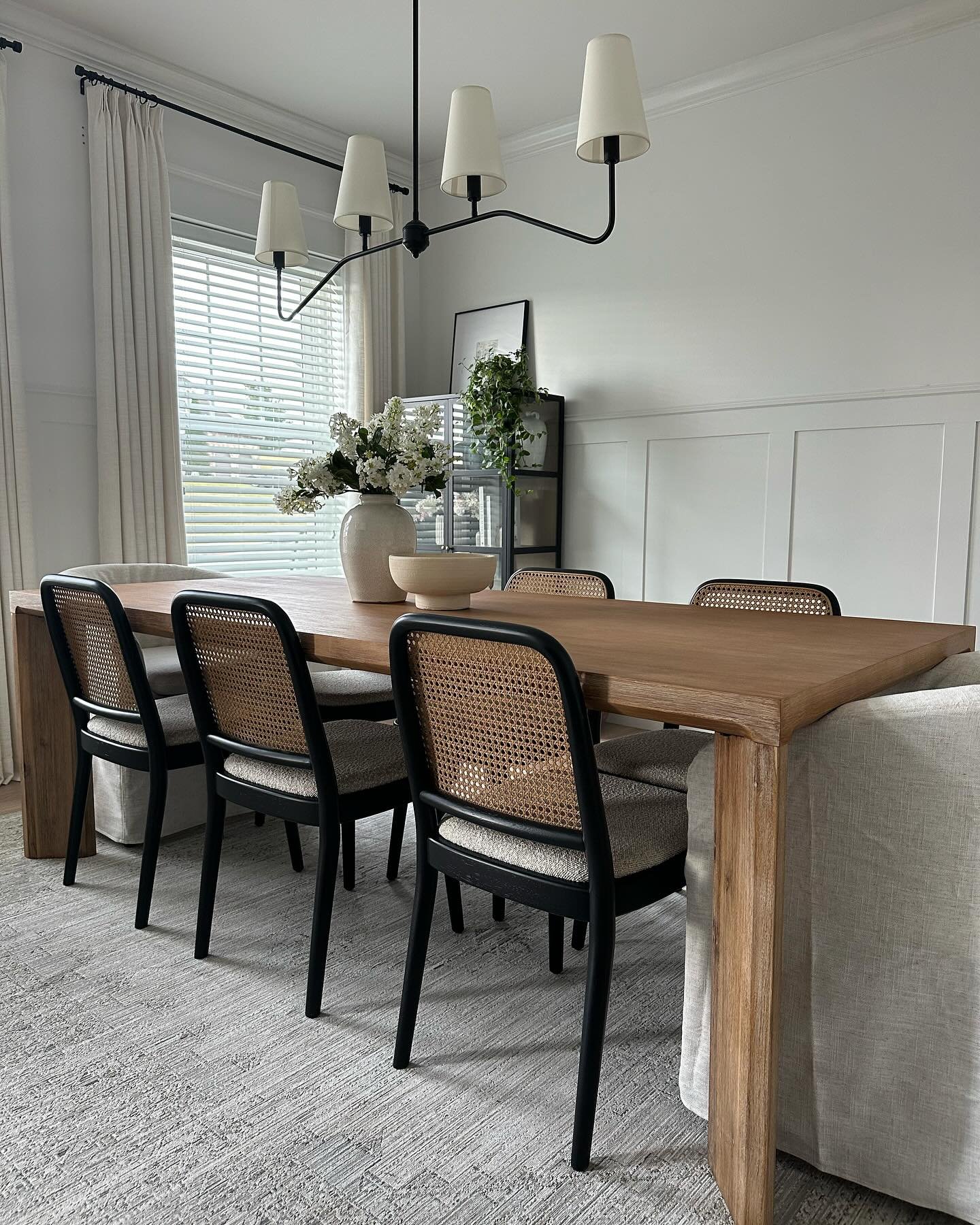 Rectangular solid wood dining table with thick block legs