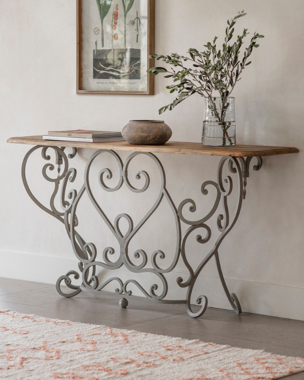 Wood and iron hallway table with scroll design