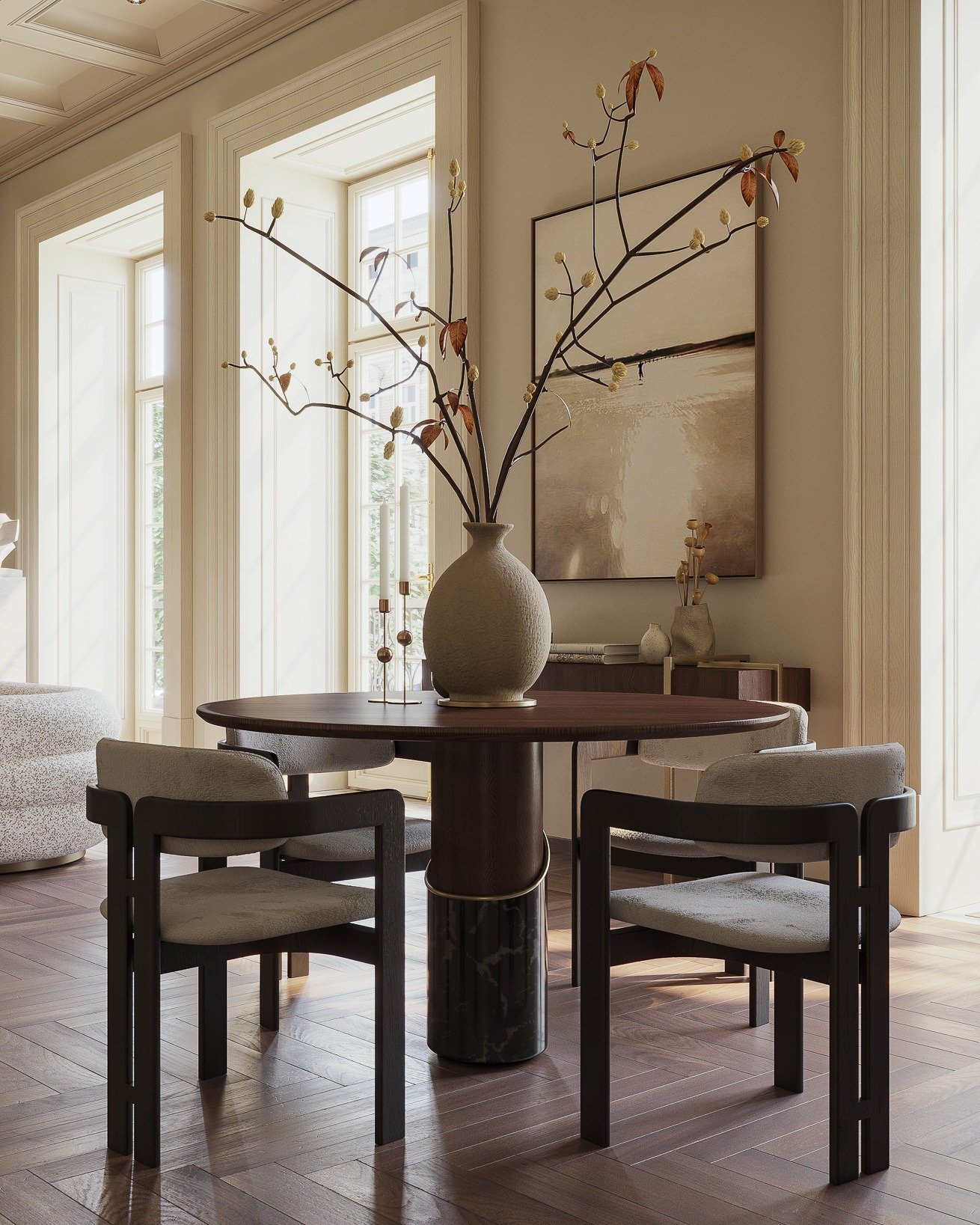 Round dark wood dining table with cylindrical base and modern armchairs