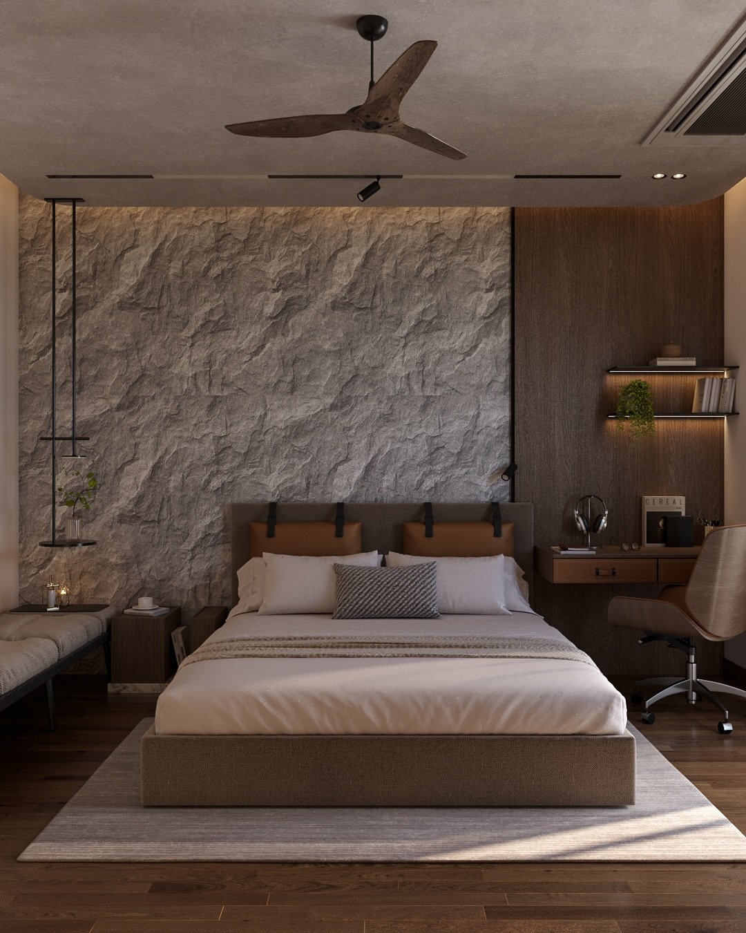Modern bedroom featuring a rough stone wall, built-in wooden desk, and headboard with hanging leather cushions