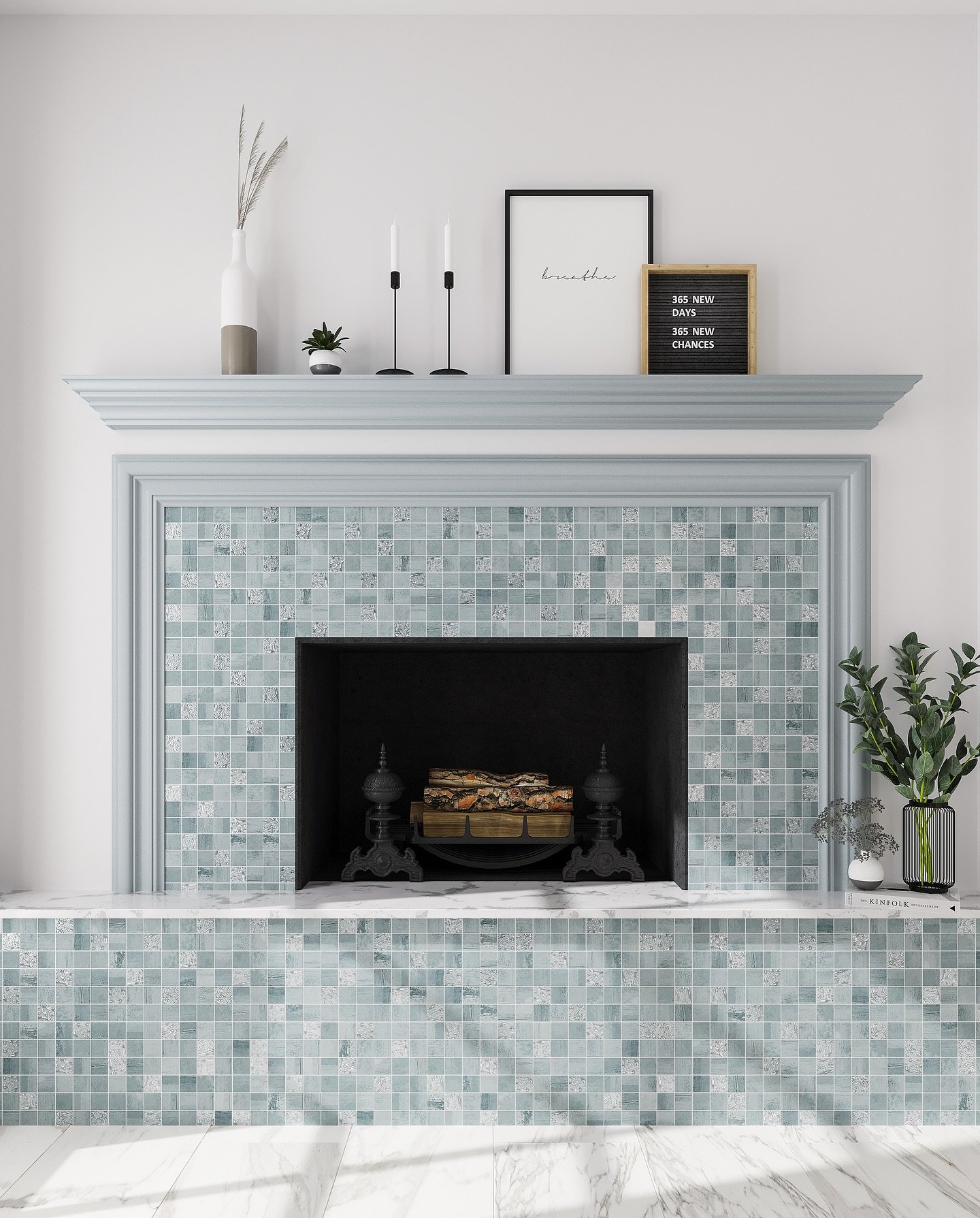 A white painted fireplace with a light blue-gray mantel, featuring a surround and hearth tiled with small square blue-green glass mosaics.
