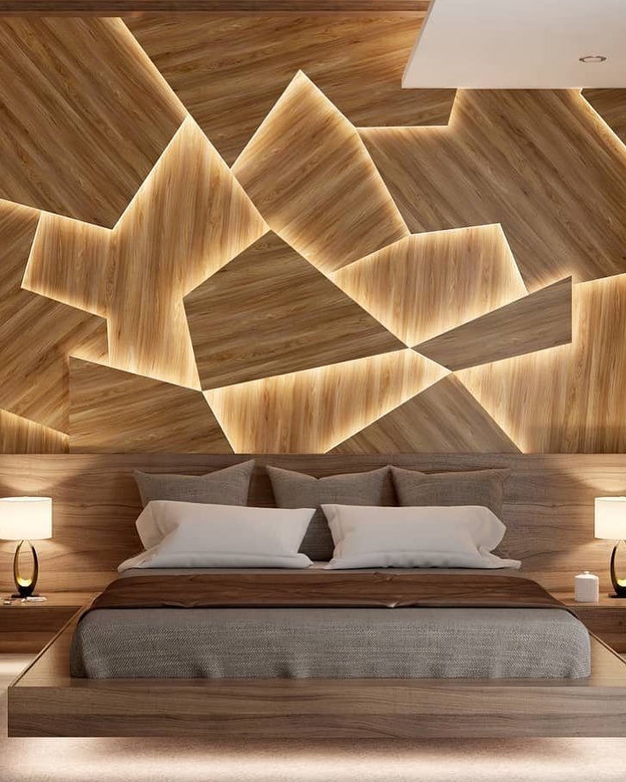 Bedroom accent wall featuring irregular geometric wood panels with backlit LED edges.
