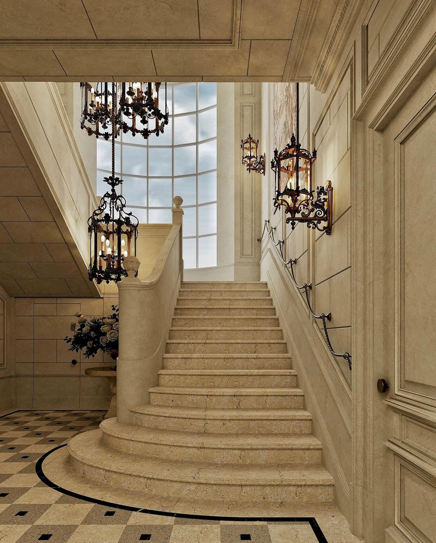 Grand staircase featuring beige limestone wall cladding, ornate black gothic lanterns, and a large arched window.
