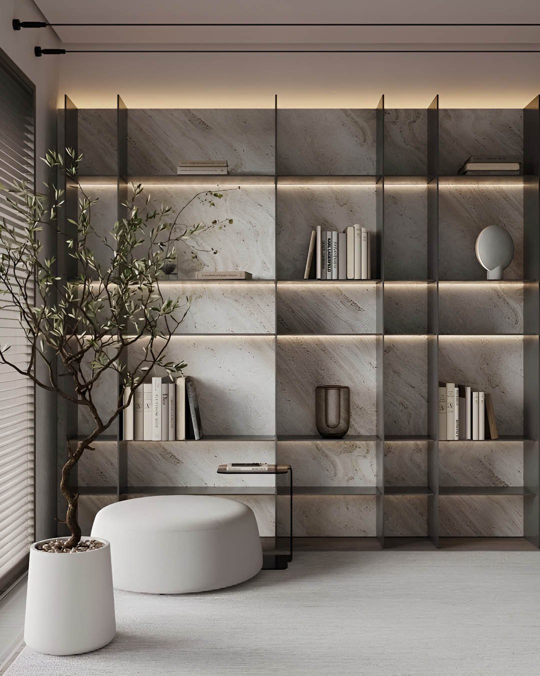 Floor-to-ceiling shelving unit featuring a stone back panel lit by warm LED strips under each shelf.