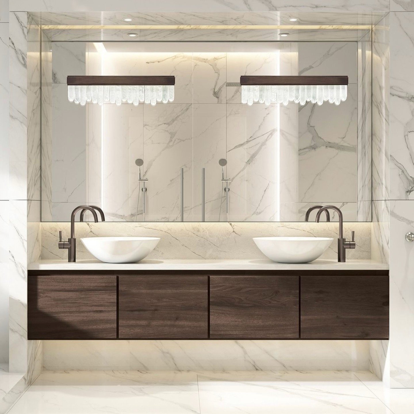 White marble bathroom featuring double vanity with mirror-mounted crystal bar lights