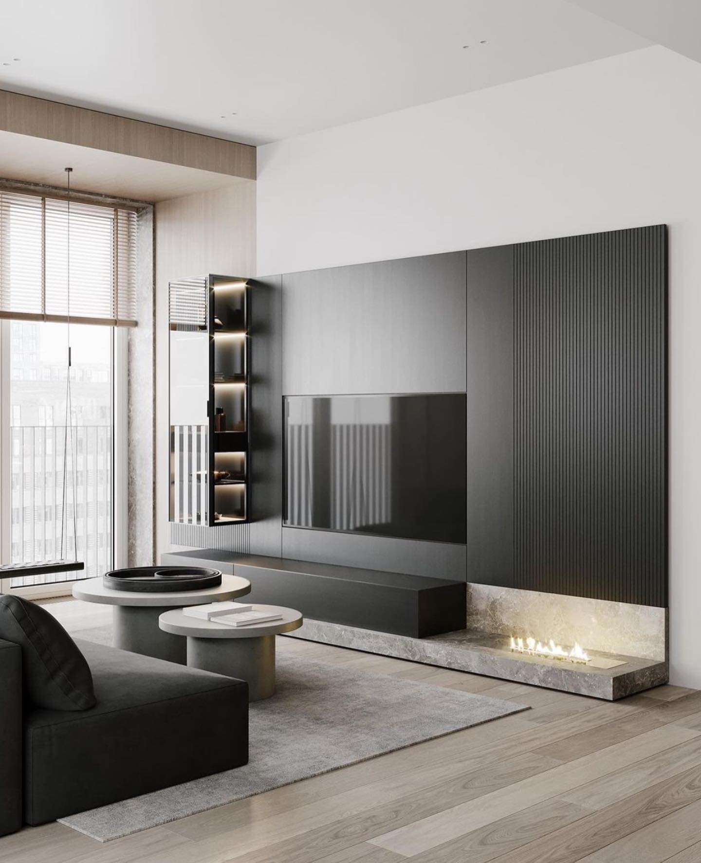 Modern black TV wall with fluted texture, glass display cabinet, and stone hearth.