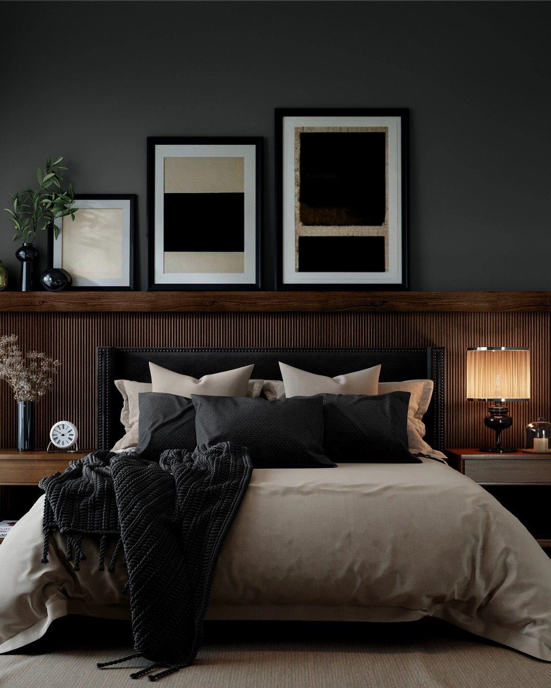 Three black framed abstract prints leaning on wooden slat shelf above bed