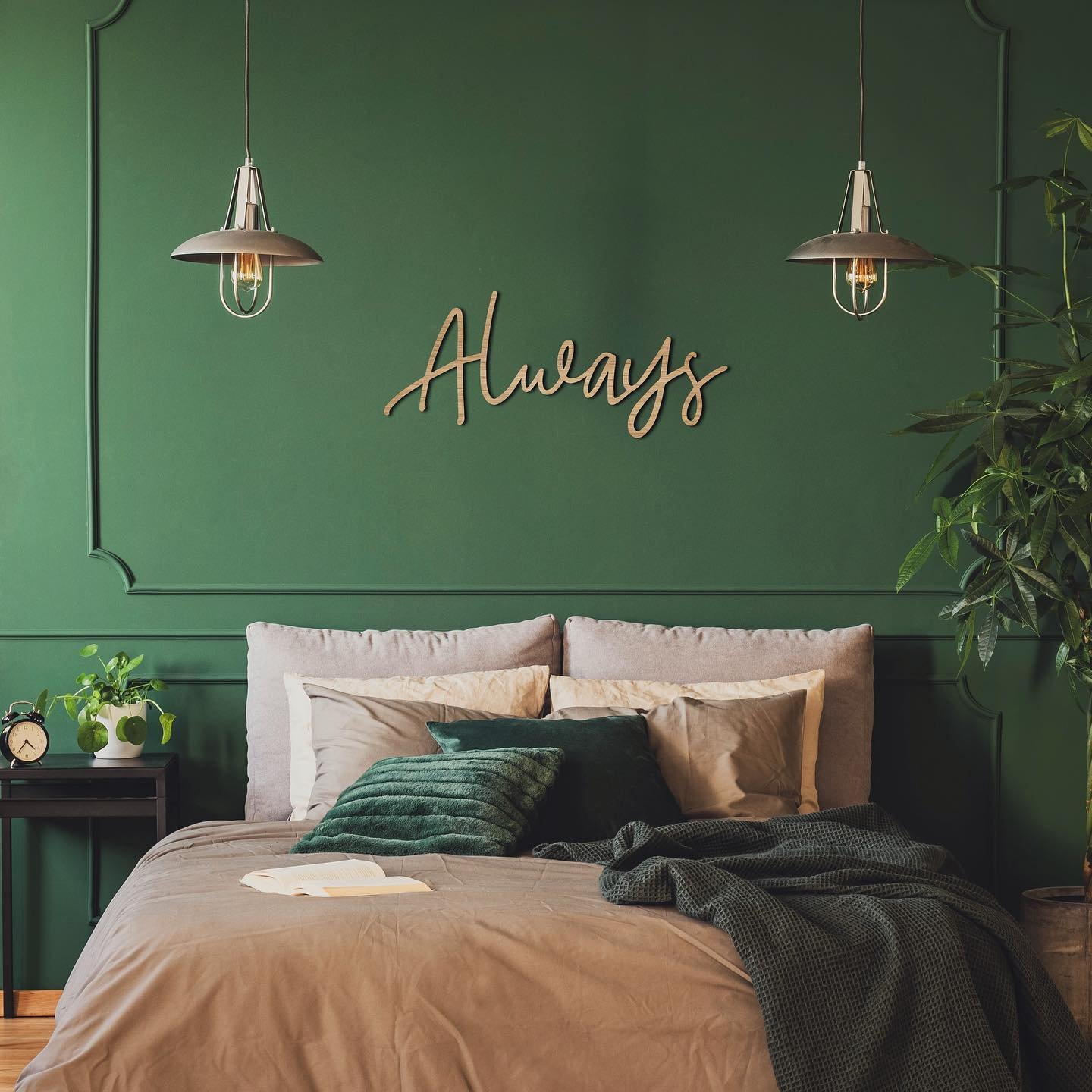 Wooden word art reading Always on green paneled wall above bed