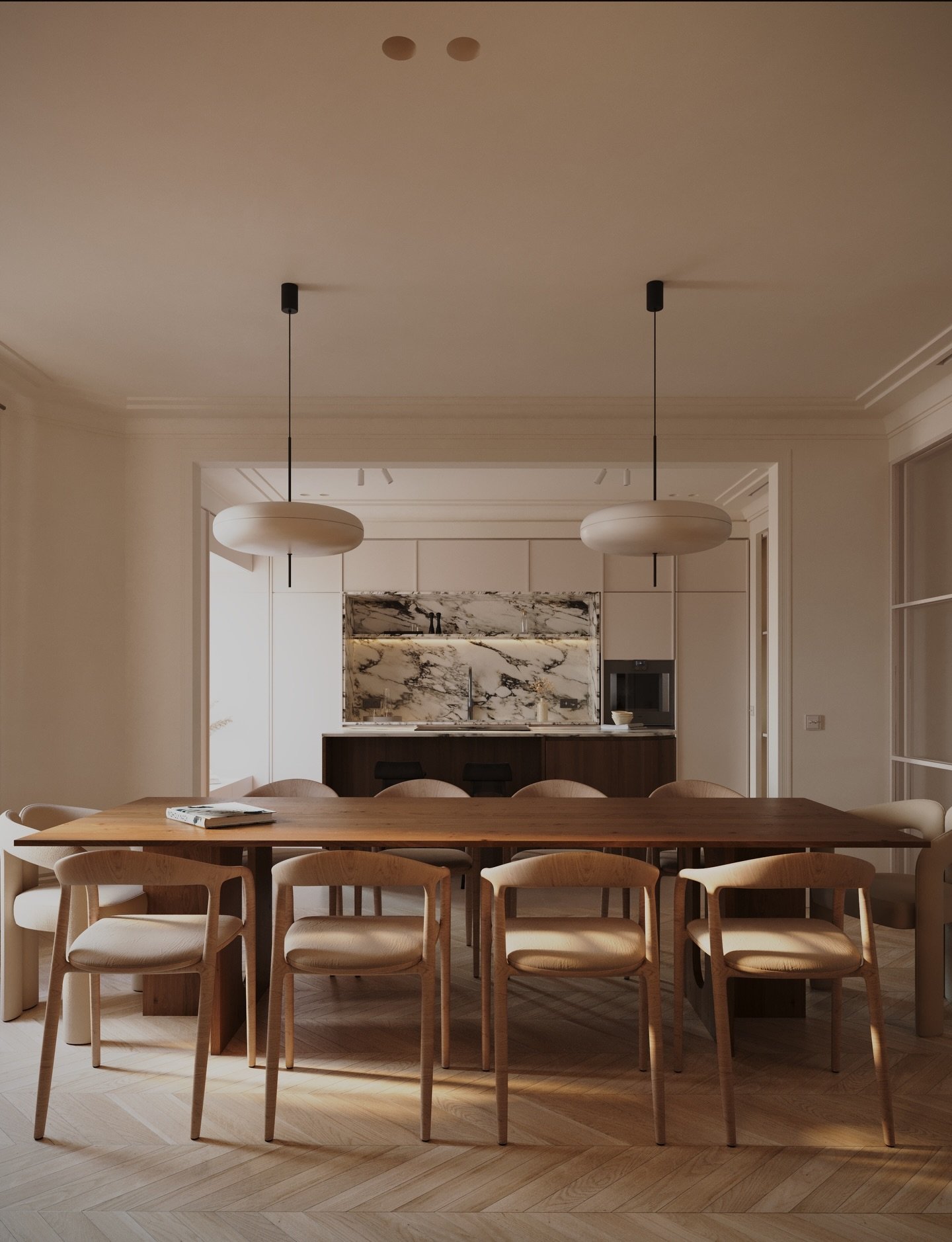 Flat white disc pendant lights hanging over a long wooden dining table in a minimalist room.