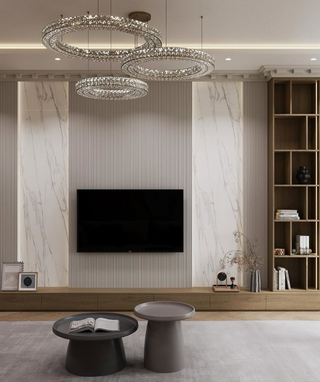 White marble and beige fluted TV wall with tall wooden shelving unit.