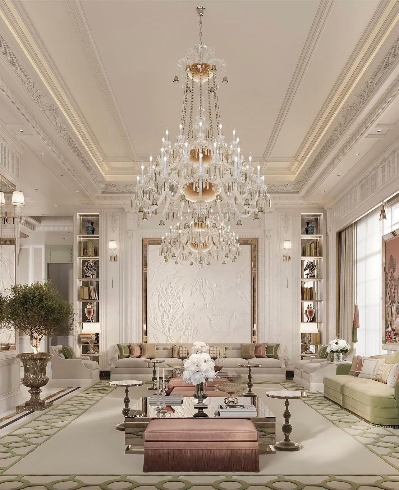 Grand luxury living room featuring a massive crystal chandelier and a white floral relief accent wall flanked by lit shelves.